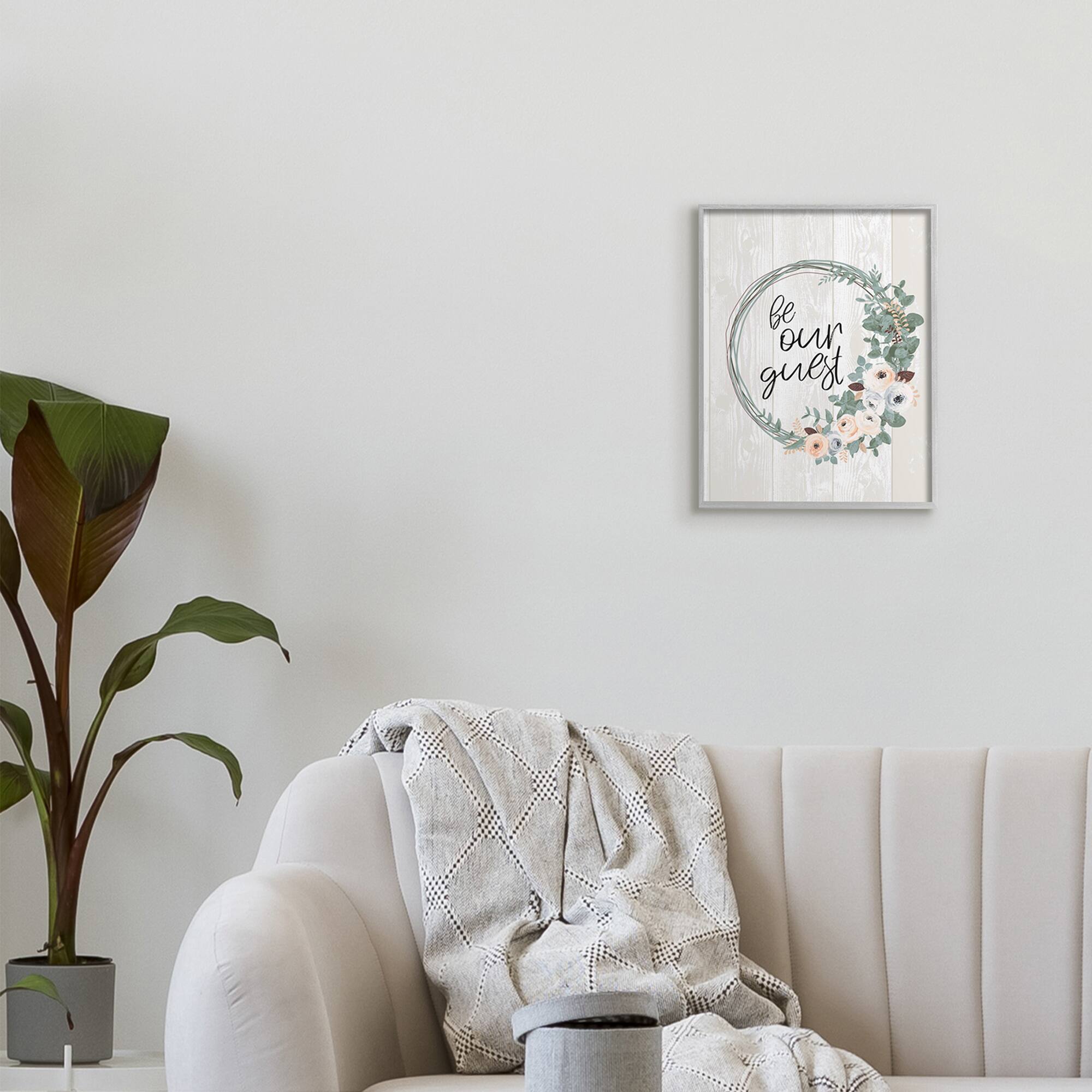 Stupell Industries Be Our Guest Greeting Charming Floral Wreath in Gray Frame Wall Art